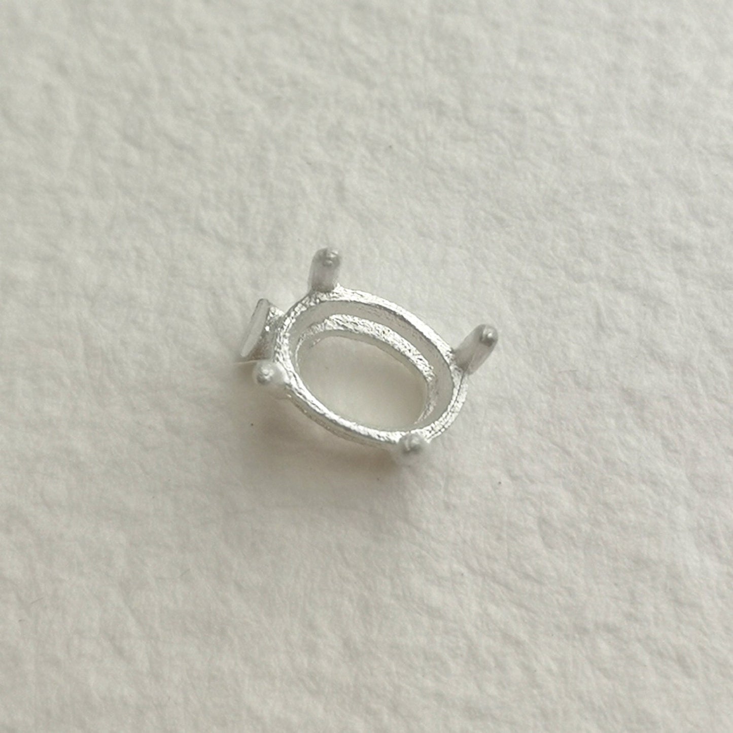 6x4mm / 7x5mm Oval 4 claw sterling silver cast stone setting