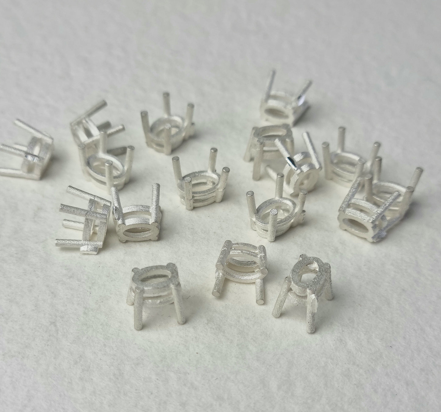 7x5mm Oval 4 claw sterling silver cast stone setting
