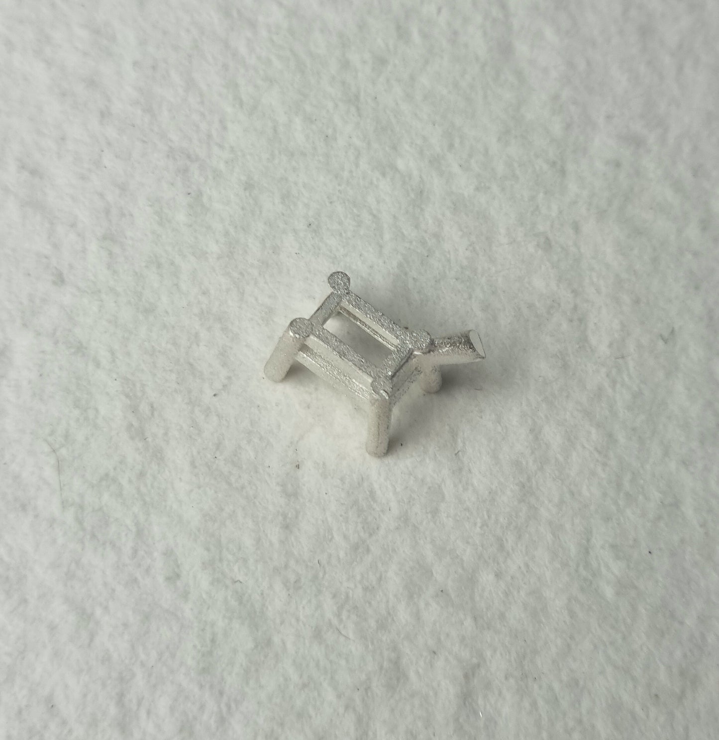 7x5mm Octagon / Emerald 4 claw sterling silver cast setting